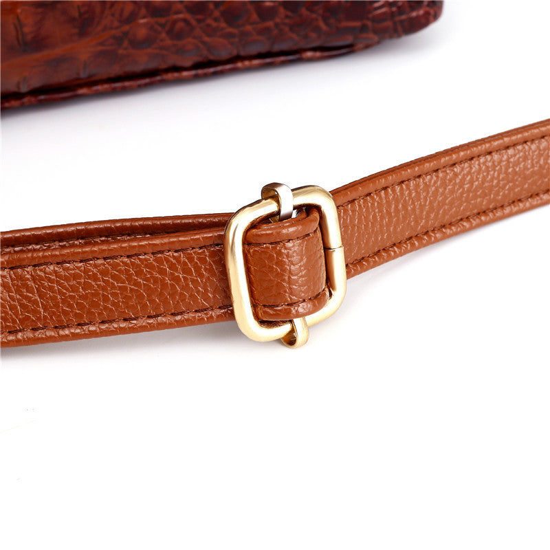 Women's elegant vintage shoulder bag, rich croc embossed texture, perfect everyday accessory.