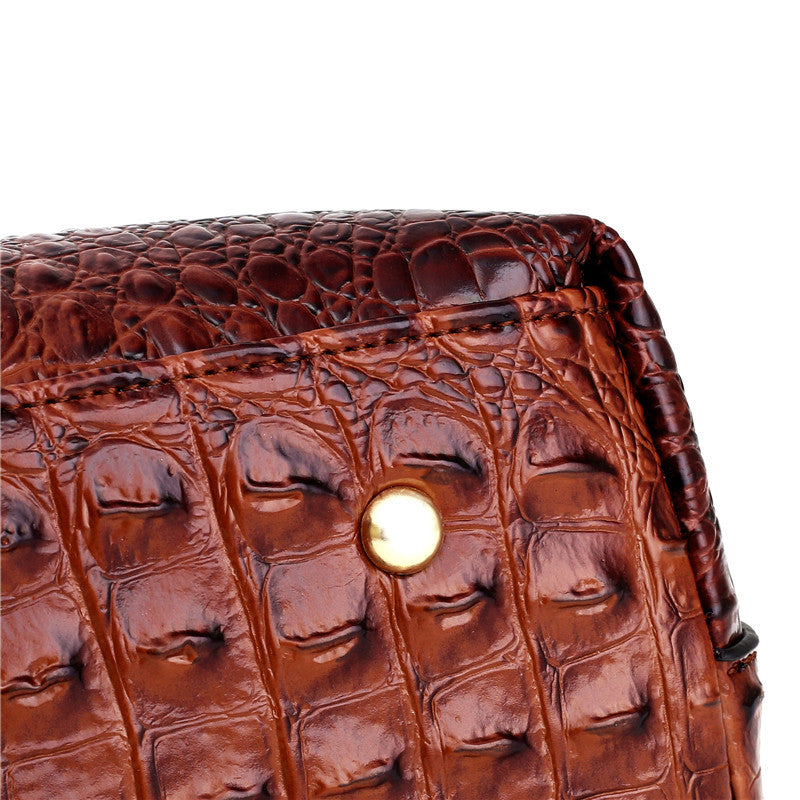 Stylish croc embossed faux leather handbag, vintage design, a versatile women's accessory.