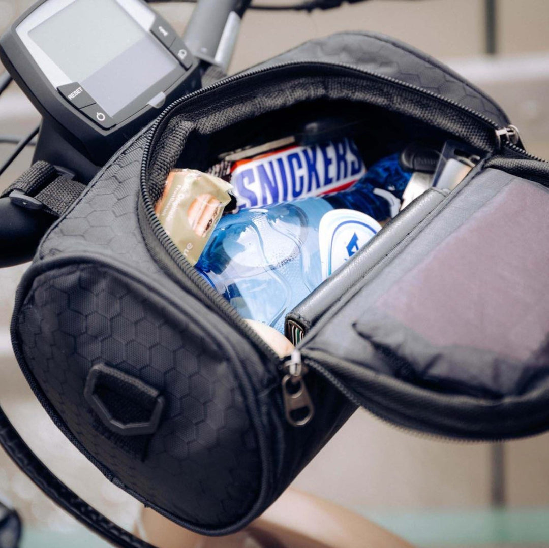 Detail of the touchscreen functionality on a waterproof bike handlebar bag for GPS/apps.