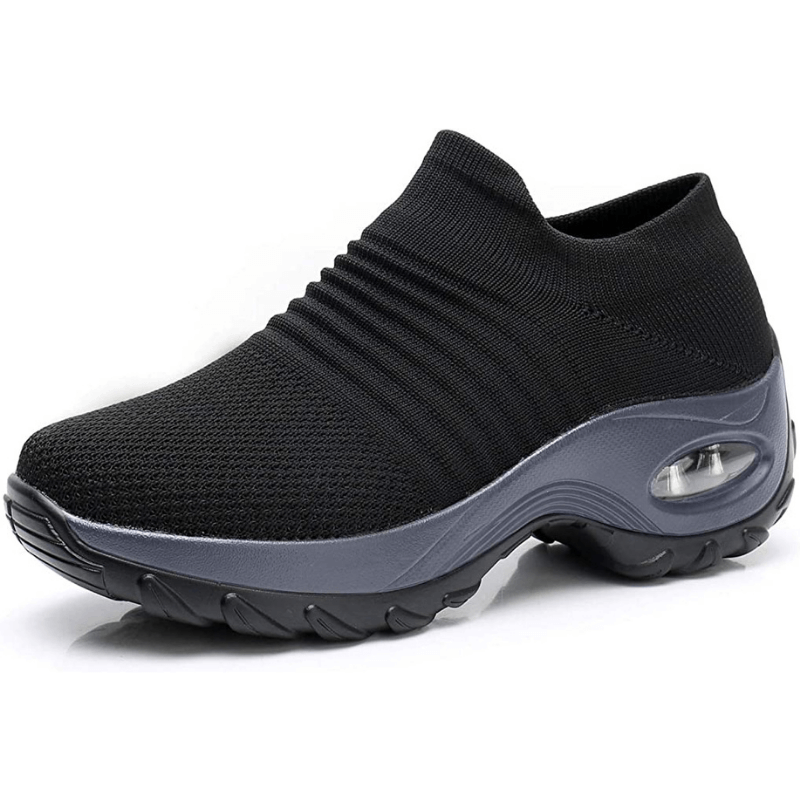 Pair of supportive women's comfort shoes, ideal for foot pain relief.