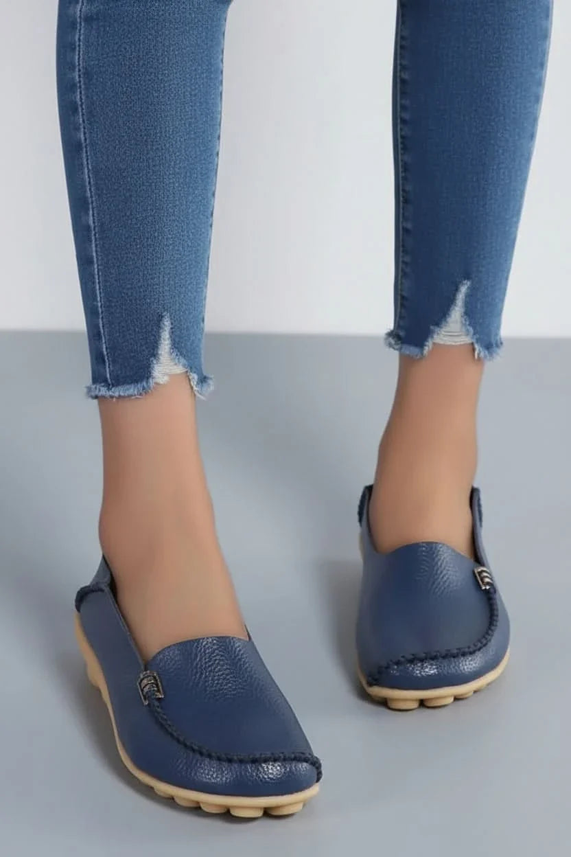 Pair of versatile women's round toe flats for everyday casual wear & travel comfort.