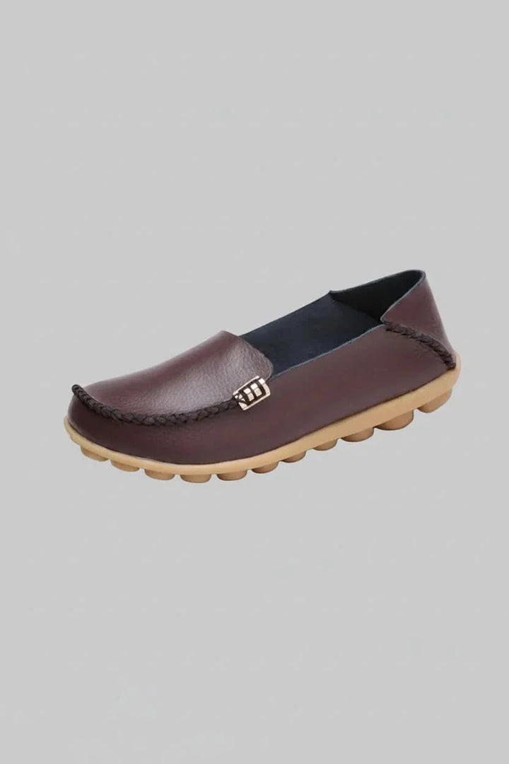 Women's everyday slip-on flats with plush cushioning, ensuring maximum comfort & style.