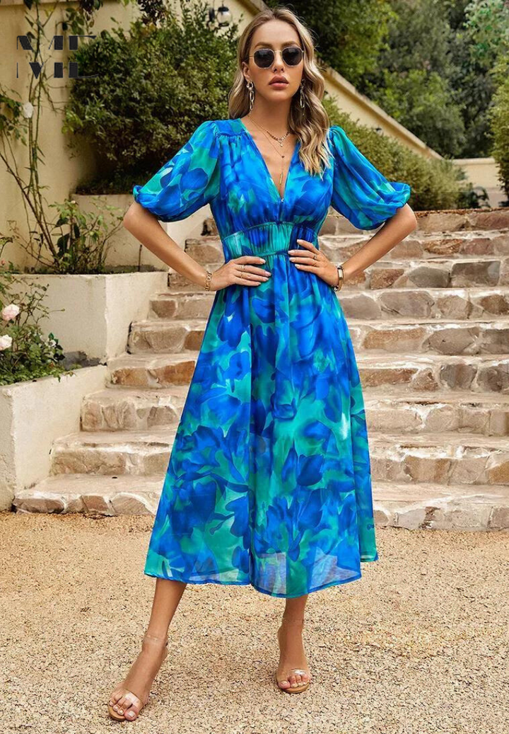 Women's summer fashion: a short sleeve V-Neck Midi Dress with a charming floral print & tie-waist.