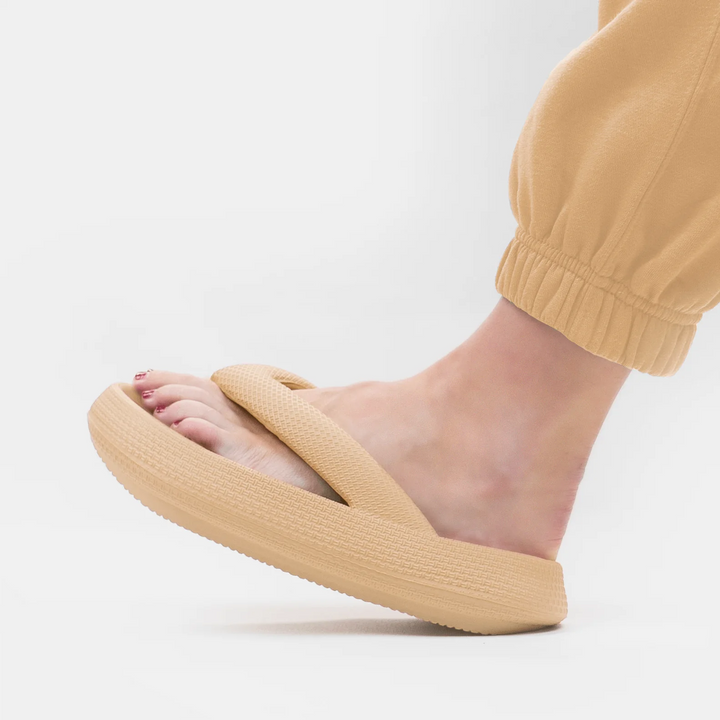 Lightweight summer flip flops with a flexible, non-slip sole for poolside and casual wear.