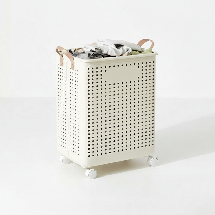 Wheeled laundry hamper with sturdy handles for smooth transport. Ideal for moving heavy loads to washer/dryer.