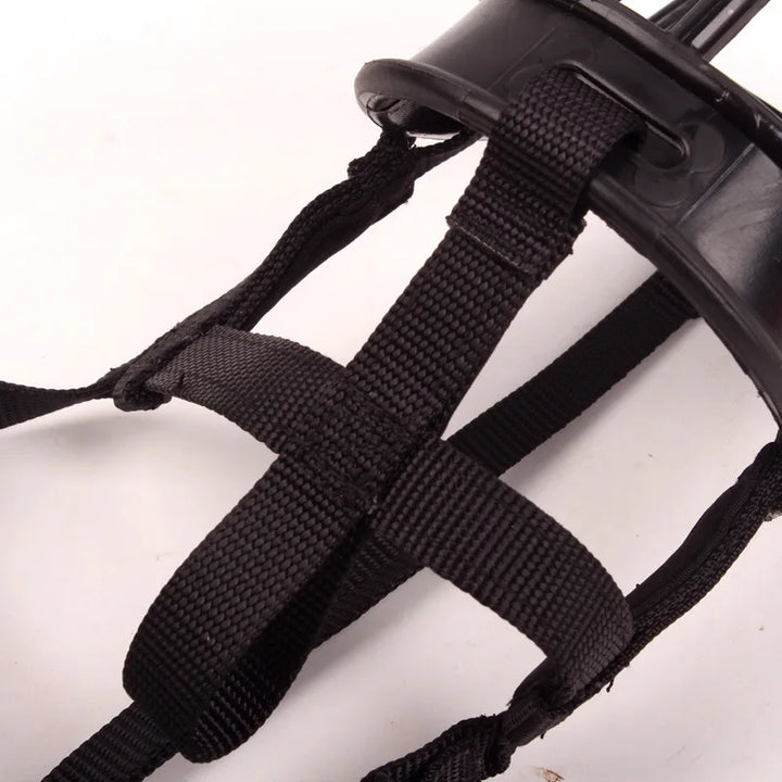 Adjustable silicone muzzle for dog training, promoting safety & preventing bites.