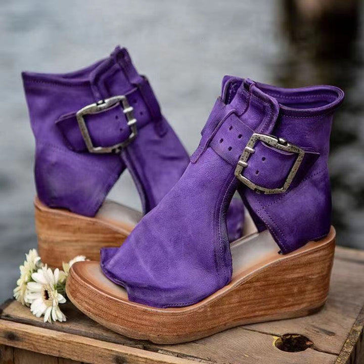Comfortable women's boho wedge sandals with adjustable buckle, ideal for stylish summer footwear.