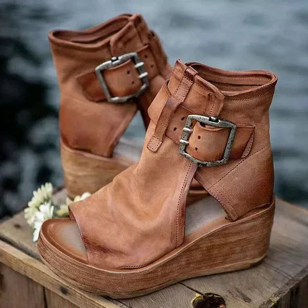 Textured straps on women's boho wedge sandals, providing comfortable and casual summer footwear.