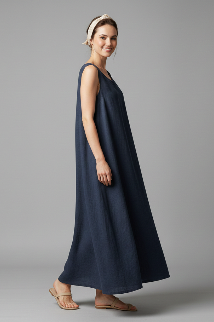 Effortless women's knee-length dress with a comfortable relaxed fit, round neck, short sleeves, and pockets.