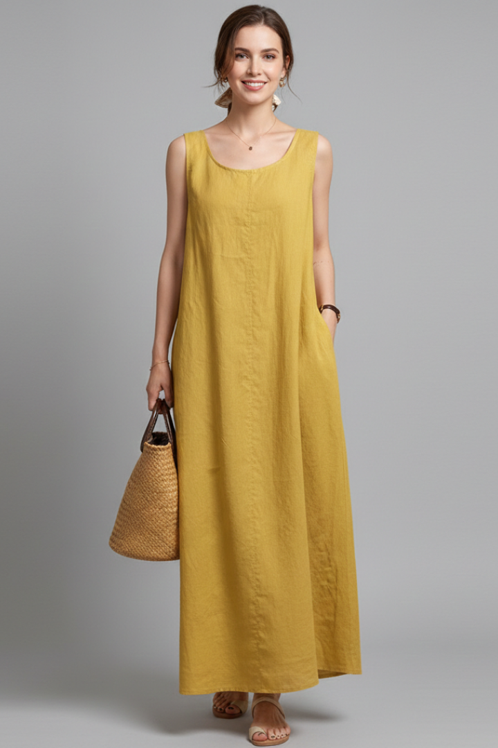 Chic comfortable women's knee-length dress with a round neck, short sleeves, and convenient pockets.