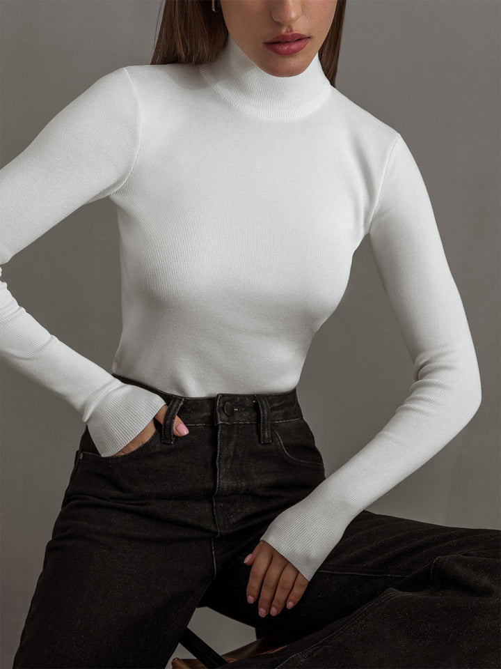 Comfortable mock neck long sleeve top for women, paired with jeans for a casual look
