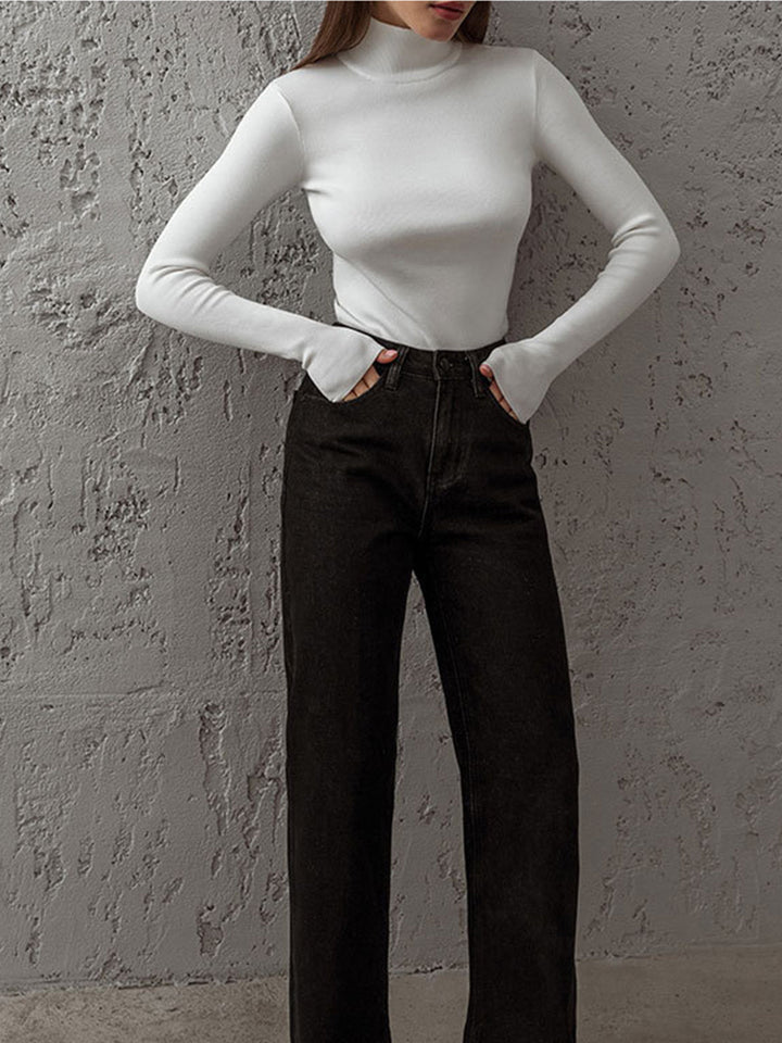 Detail shot of the mock neck collar on a women's long sleeve top, showcasing quality
