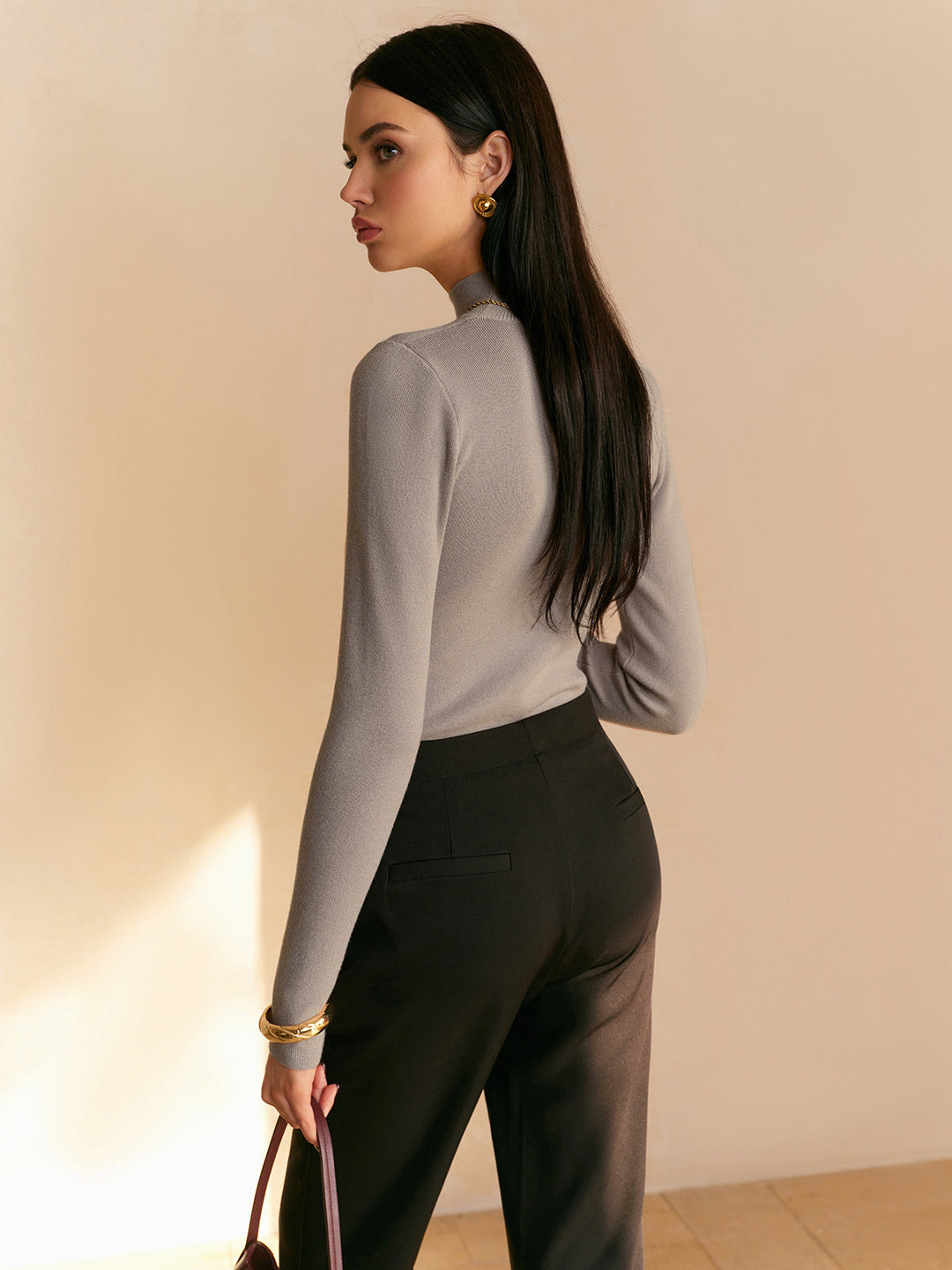 Close-up of the fabric texture of a comfortable women's mock neck long sleeve top
