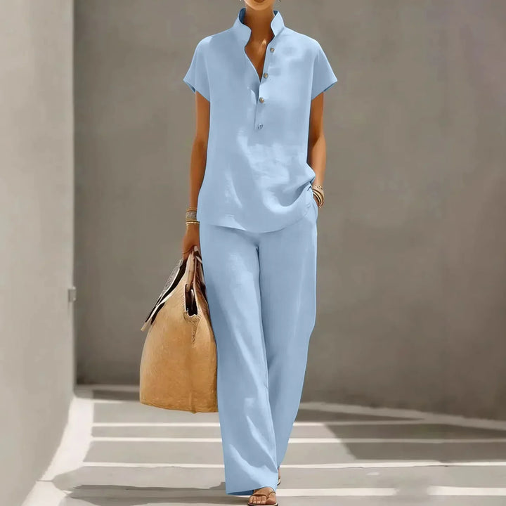 Comfortable women's short sleeve two-piece lounge set with wide leg pants, perfect for relaxing or resort wear.