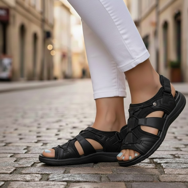 Open-toe slip-on women's sandals, comfortable & stylish for warm weather everyday wear.