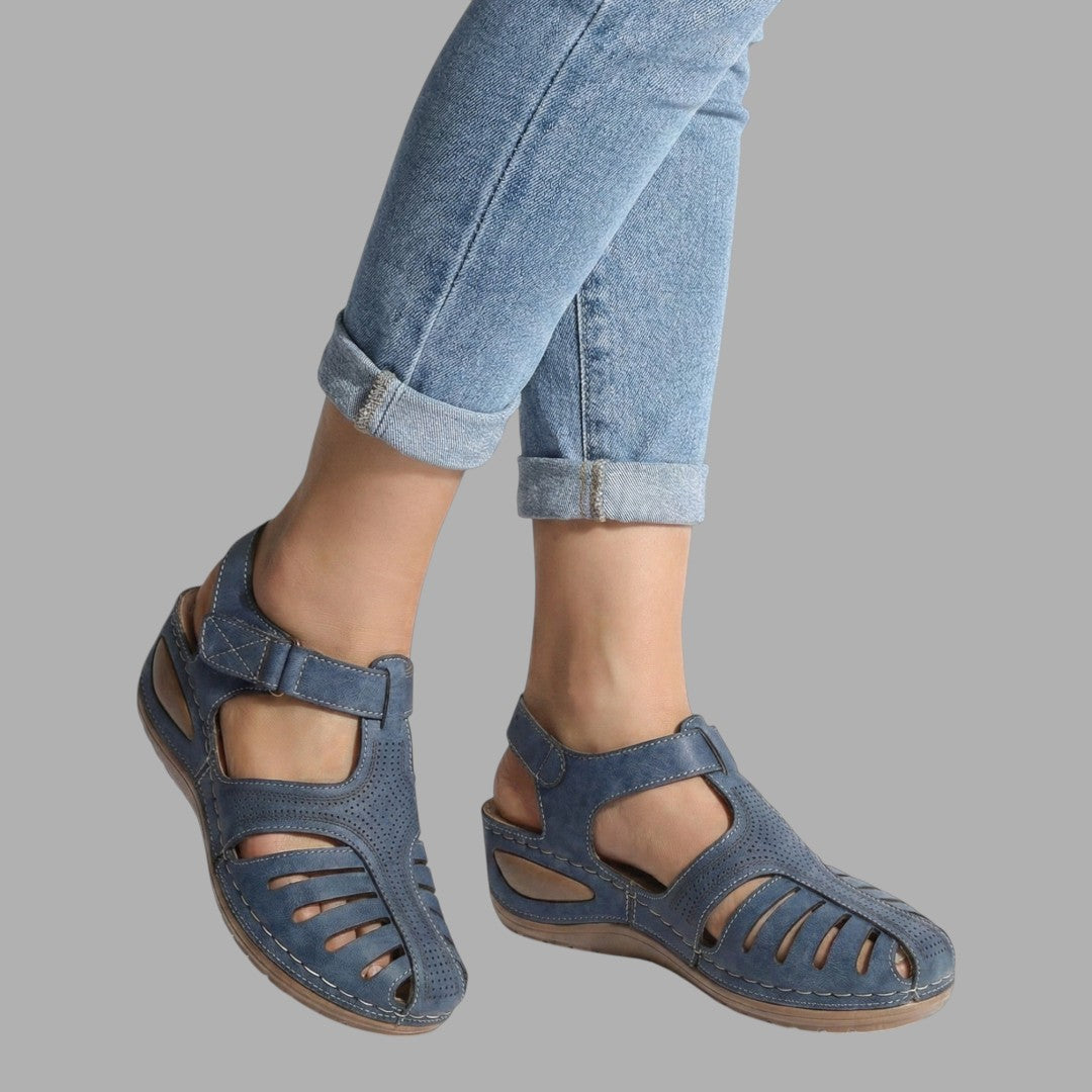 Breathable slip-on women's wedge sandals, offering comfortable support for casual summer footwear.