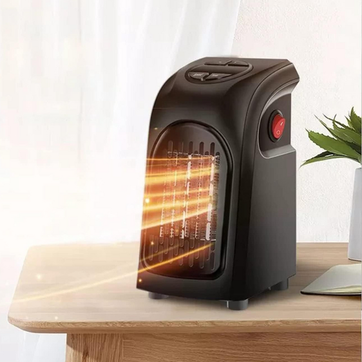 TavvitaImp010 compact plug-in electric heater for targeted personal warmth, features powerful fan.