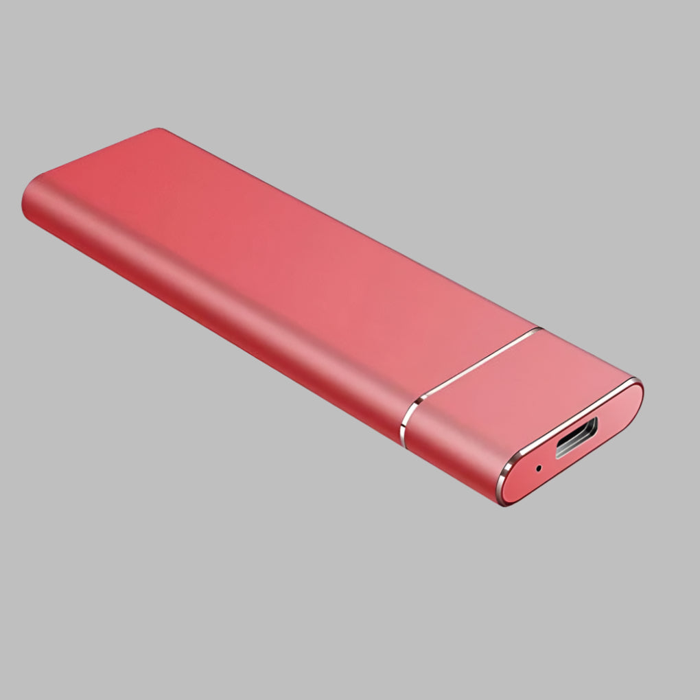 Portable external SSD for fast data backup, shown connected to a laptop for mobile storage on the go.