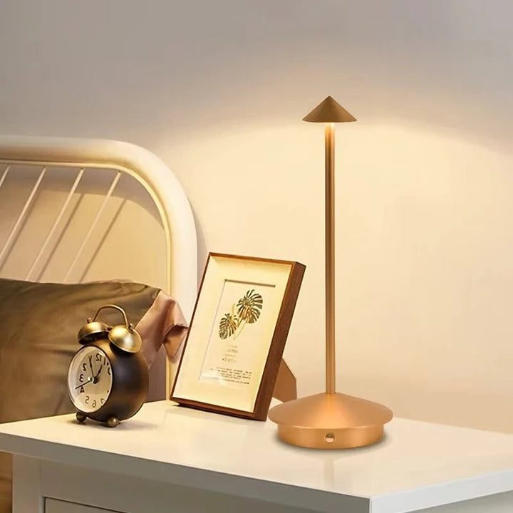 Portable LED desk lamp, 3 light modes, touch control dimming, offers flexible modern lighting for home.