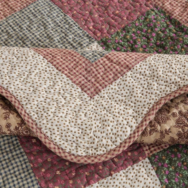 Stylish cotton quilted sofa protector, offering a washable and non-slip solution for your couch and home.