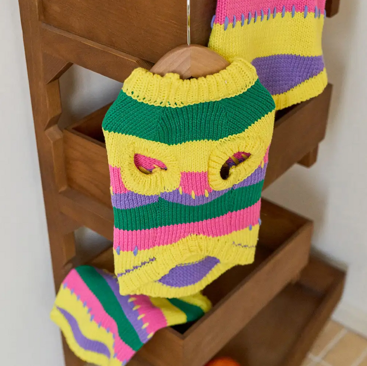 Playful color-blocked striped knit dog jumper, sleeveless design for small dogs. Cozy & fashionable pet apparel.