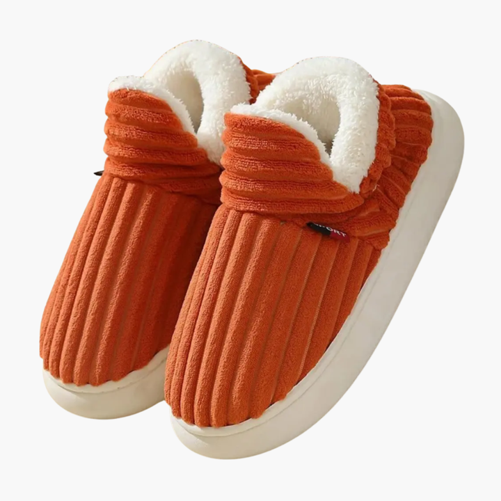 Cozy ribbed women's bootie slippers for ultimate home comfort. Warm, slip-on indoor shoes, perfect loungewear.