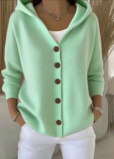 Stylish women's hooded button-up cardigan. A cozy layering piece with front pockets for versatile fashion.