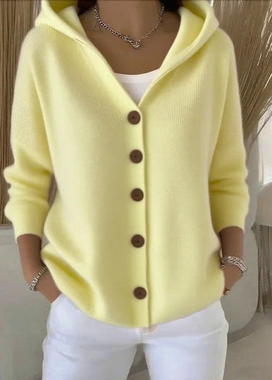Women's hooded button-up cardigan. Long sleeve, relaxed fit, front pockets for ultimate comfort & style.