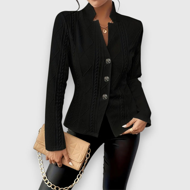 Relaxed fit women's knit sweater. Cozy long-sleeve top, perfect for casual comfortable everyday wear.