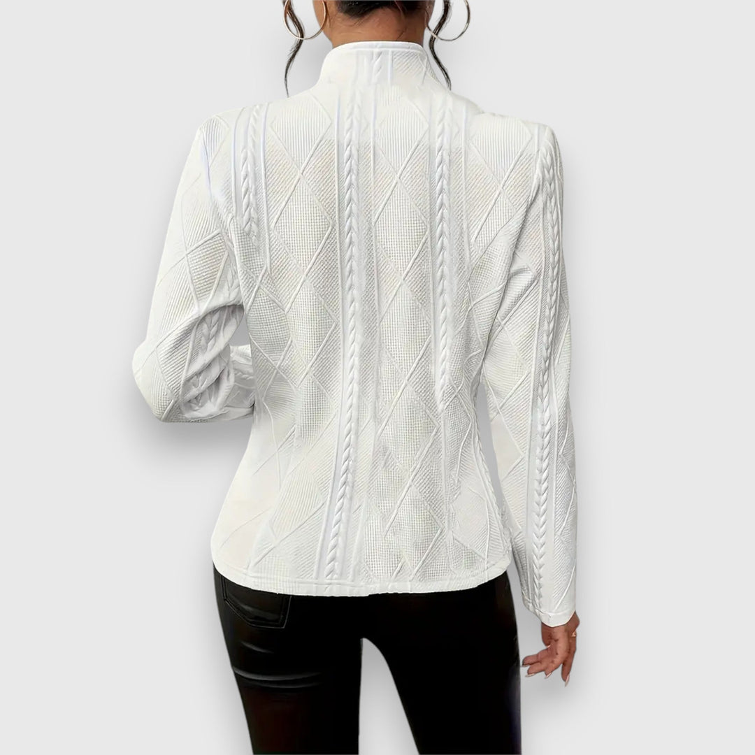 Casual women's knit sweater top. Comfortable long-sleeve pullover perfect for fall fashion.