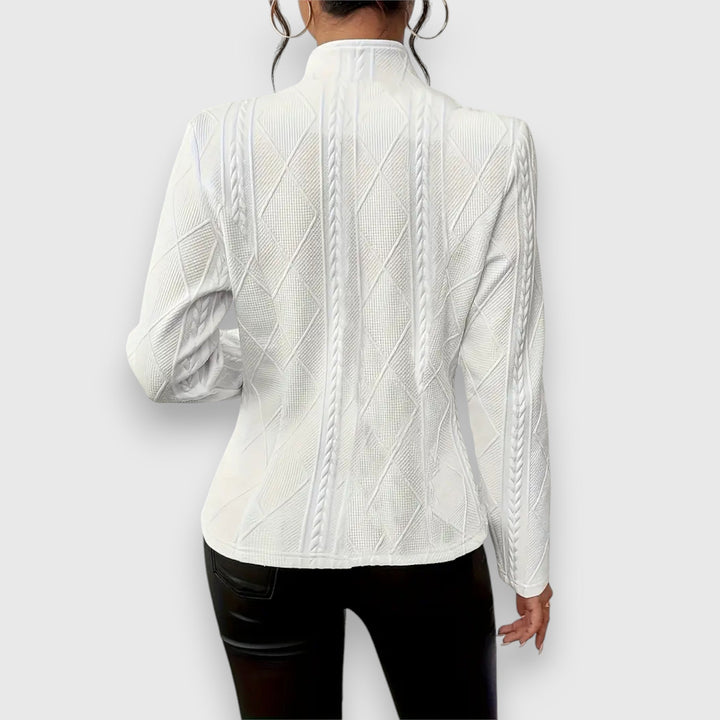 Casual women's knit sweater top. Comfortable long-sleeve pullover perfect for fall fashion.