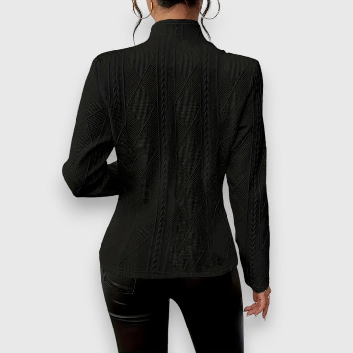 Soft knit women's sweater top. Cozy long-sleeve pullover for ultimate comfort and everyday wear.