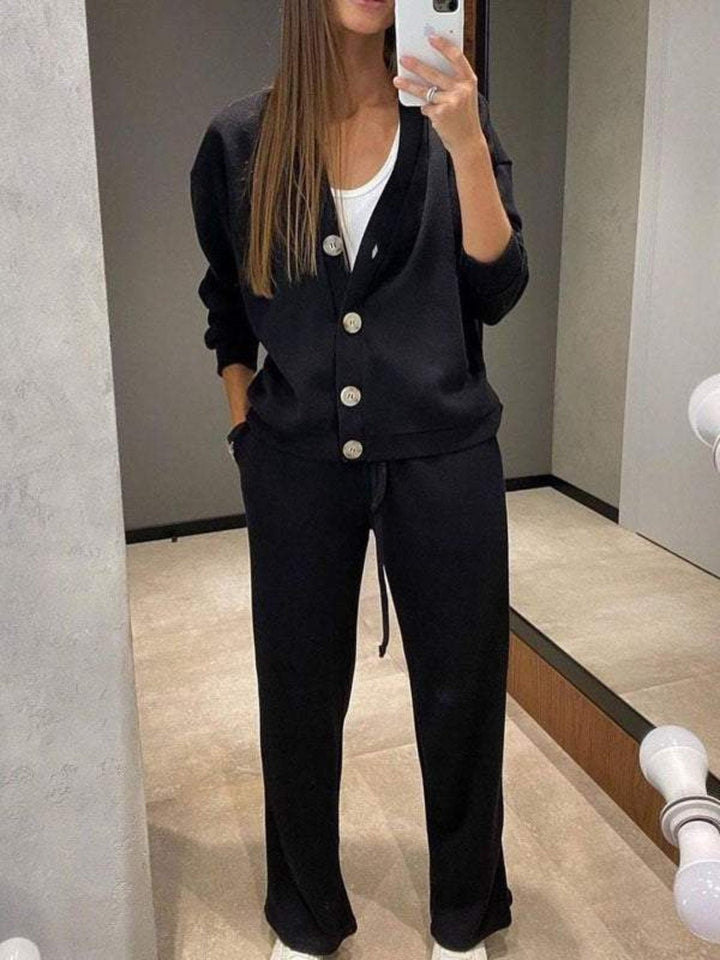 Women's two-piece casual outfit featuring a soft knit cardigan and matching drawstring pants for everyday style.