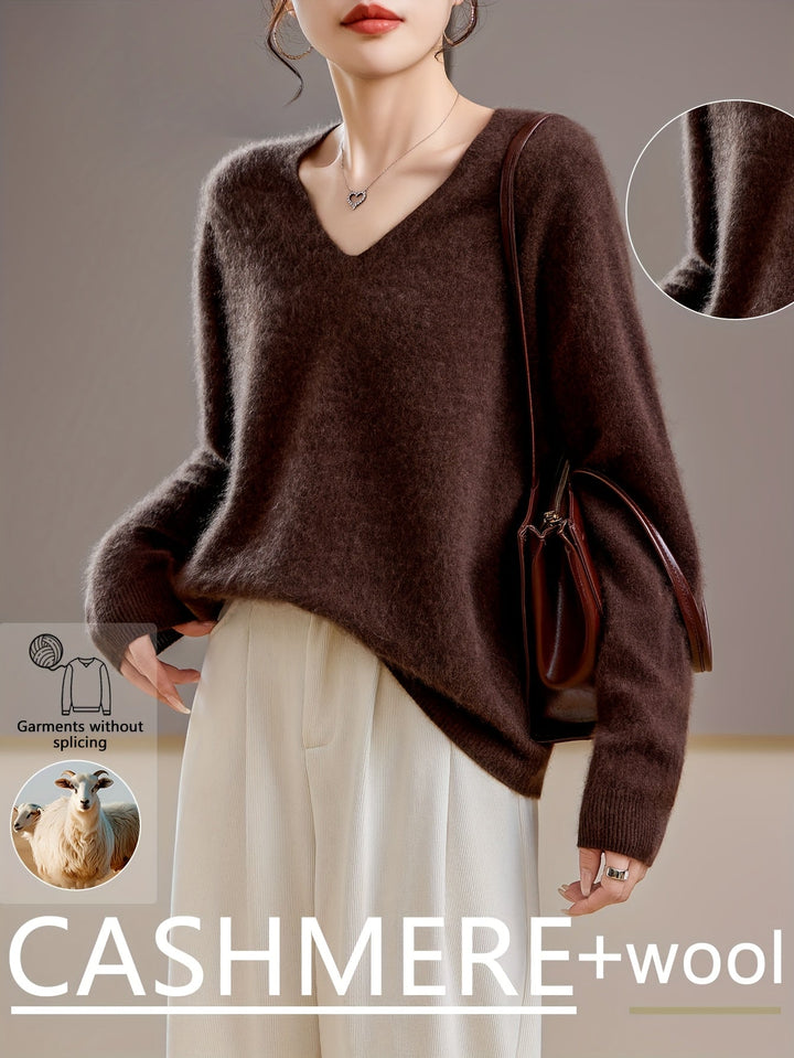 Cozy women's V-neck sweater, perfect for autumn comfort & relaxed everyday wear.