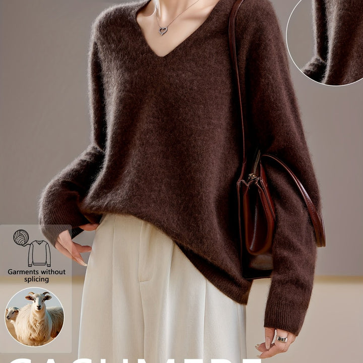 Women's V-neck sweater, an oversized & cozy comfort top for stylish autumn wear.