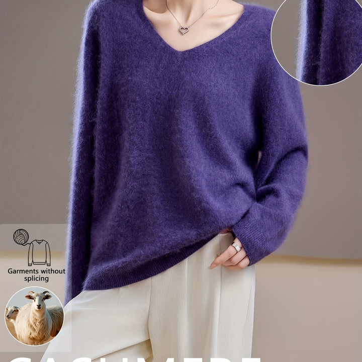 Effortless women's oversized V-neck sweater, a cozy autumn fashion piece for daily wear.
