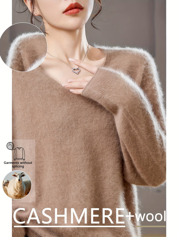 Soft knit women's V-neck sweater, an oversized cozy top for ultimate autumn comfort.