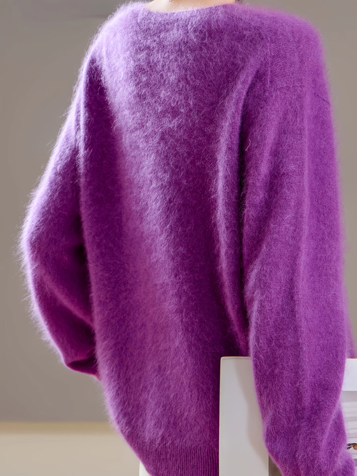 Relaxed fit women's V-neck sweater, a stylish everyday comfort sweater for autumn.