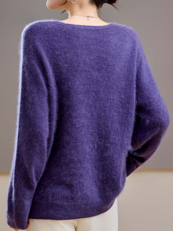 Oversized V-neck sweater for women, offering cozy comfort and stylish autumn fashion.