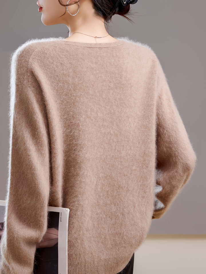 Chic women's V-neck top, an oversized sweater designed for cozy autumn comfort & style.