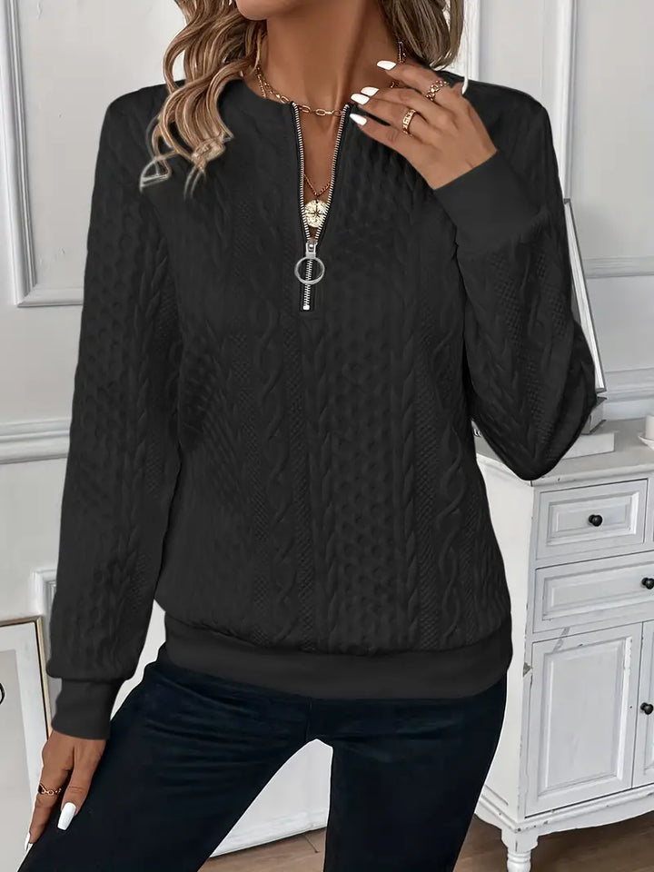 Model wearing a stylish women's cozy zippered sweater, ideal for casual everyday comfort.