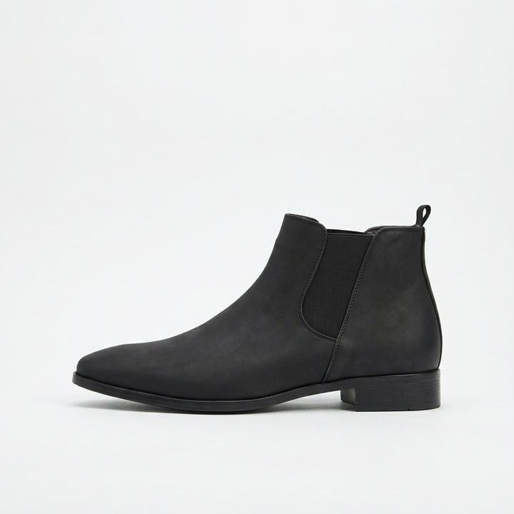 Comfortable brown Chelsea boots for men. Perfect versatile slip-on footwear for casual & dressy outfits.