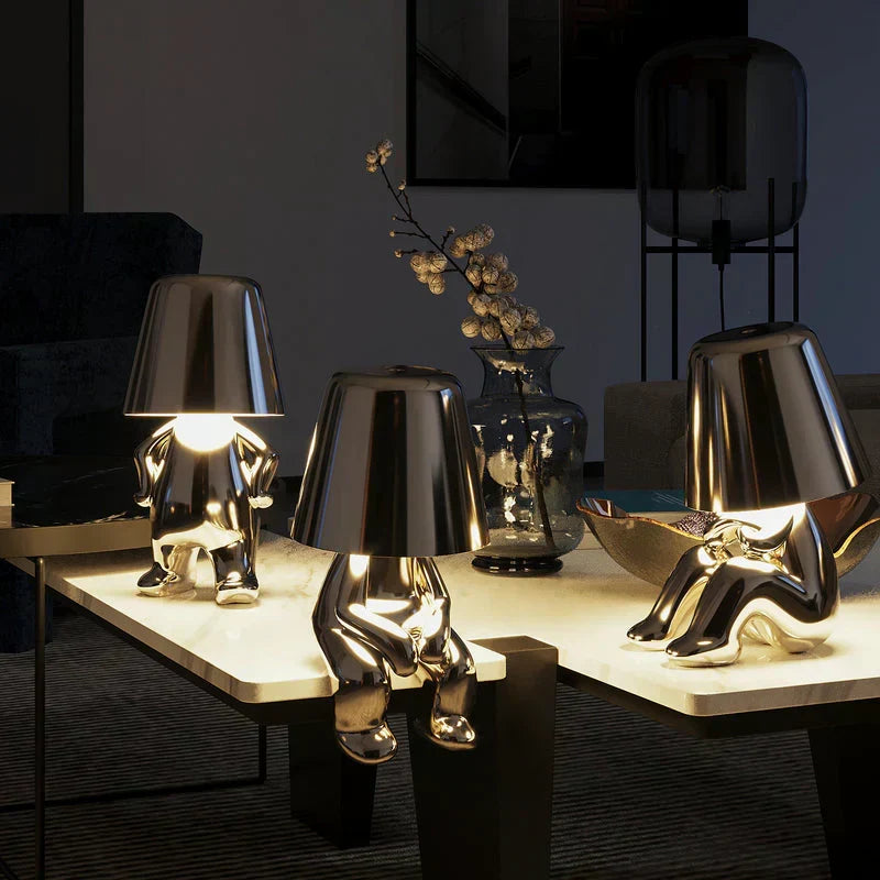 Decorative wireless table lamp, unique resin design with touch dimming feature.