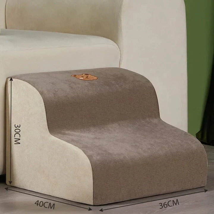 Home pet care essential: Cushioned dog stairs with removable cover, offering joint support & easy bed access.