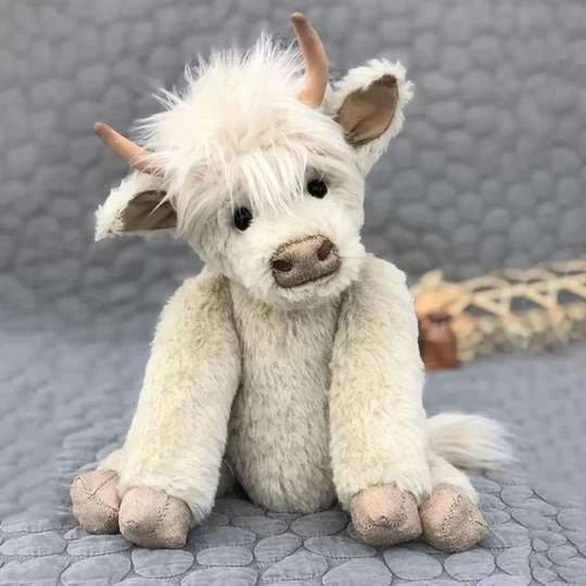 Cute handmade Scottish Highland Cow plush toy, made from soft alpaca fiber. Perfect gift for kids & home decor.