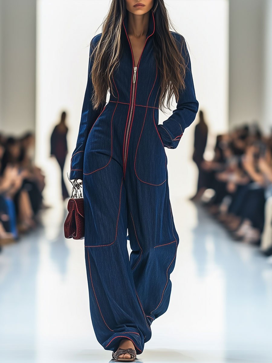 Dark blue wide leg women's jumpsuit with long sleeves and zip front for stylish, comfortable wear.