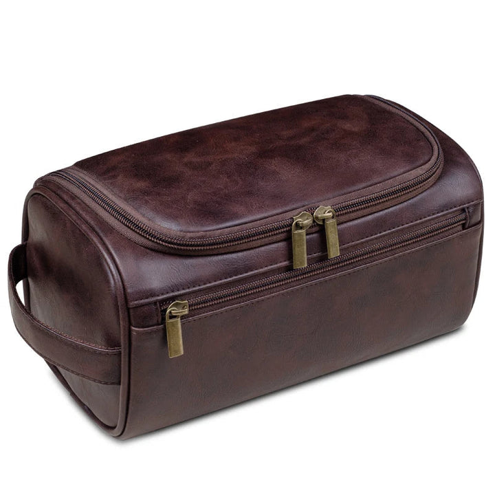 Elegant brown men's luxury travel toiletry bag. A stylish grooming kit and portable organizer for essentials.