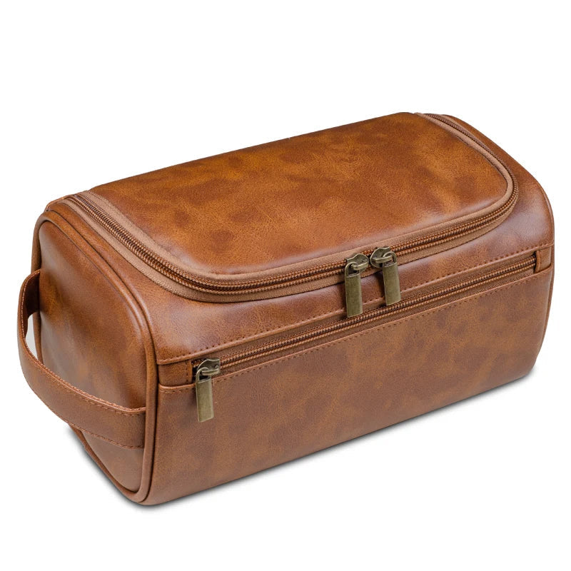 Compact dark brown men's luxury travel toiletry bag. Waterproof dopp kit for men's grooming essentials and travel.