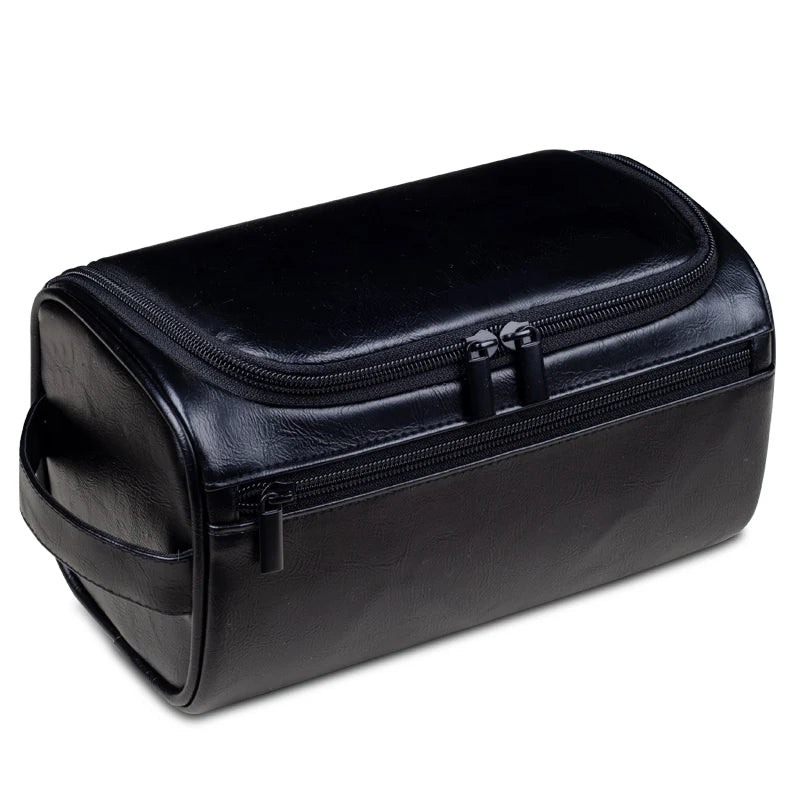 Light brown men's luxury travel toiletry bag, a waterproof dopp kit for travel and organized grooming essentials.