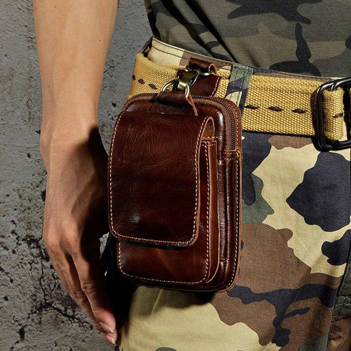 Men's fashion dark brown waist bag with multiple pockets for organized, hands-free everyday carry.